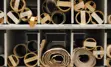 An image of rolls of parchment and stacks of aged ledgers.