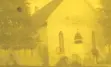 Yellow and black image of a house.