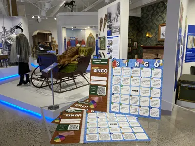 Heritage Sarnia-Lambton Bingo cards are posed in the Lambton Gallery at Lambton Heritage Museum.
