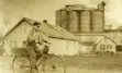 boy riding a bike in the country